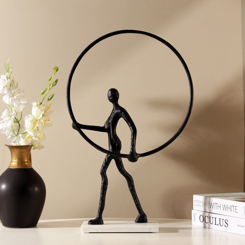 Man Walking with Ring Sculpture - Black