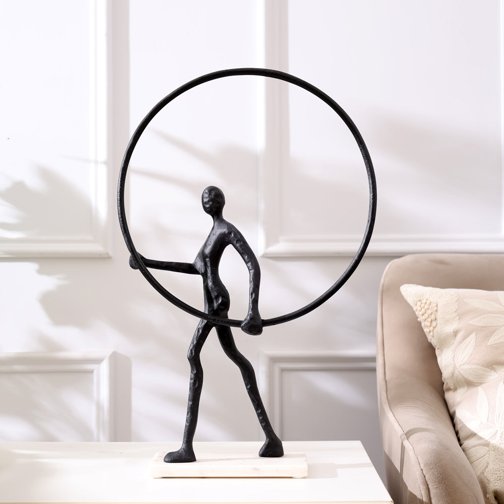 Man Walking with Ring Sculpture - Black