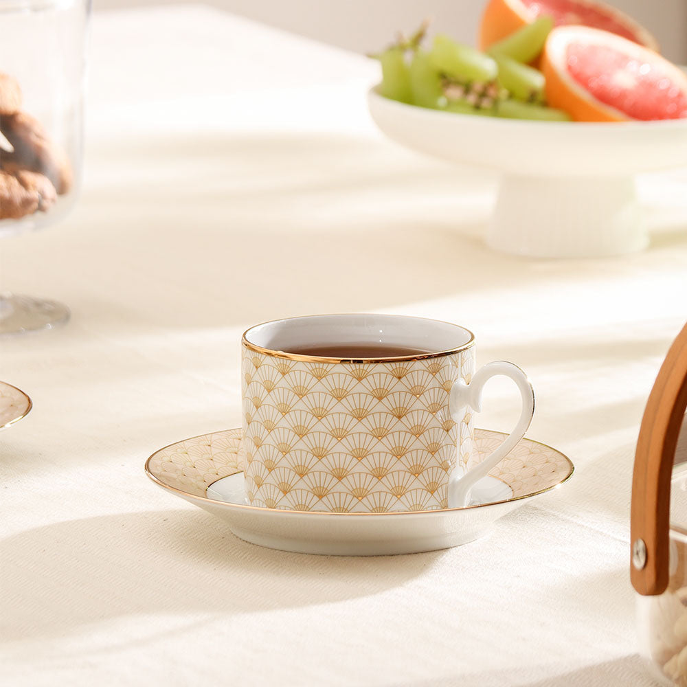 Trocadero 12-piece Porcelain Tea Set - Gold