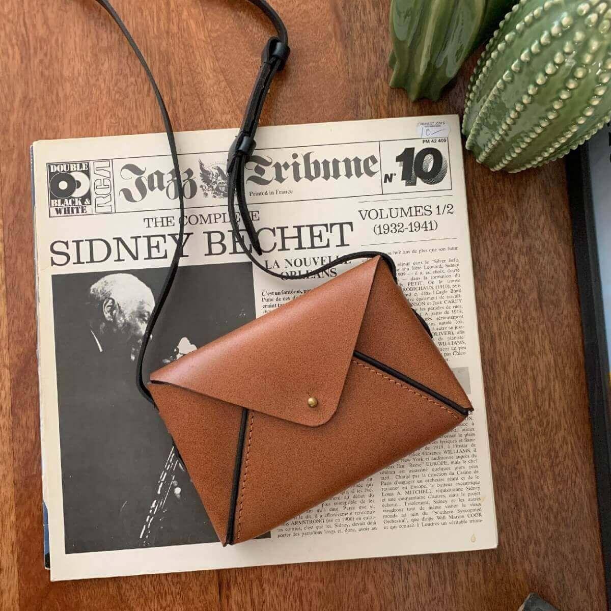 Nappa Dori Envelope Sling Bag - Tan