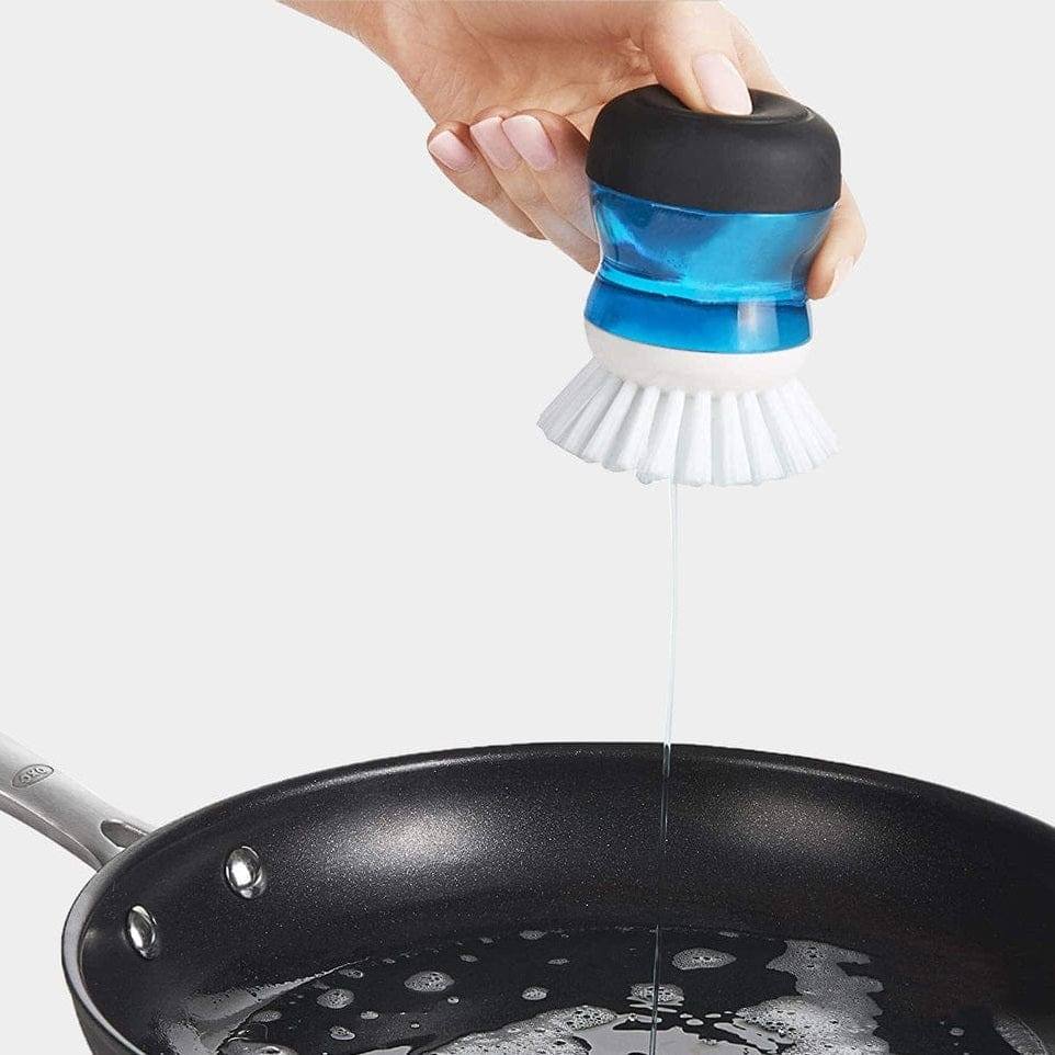 OXO Good Grips One Push Palm Brush