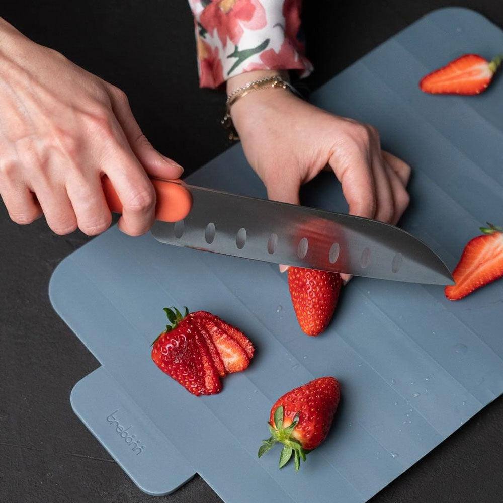 Trebonn Roll and Expand Cutting Board - Coral – Modern Quests