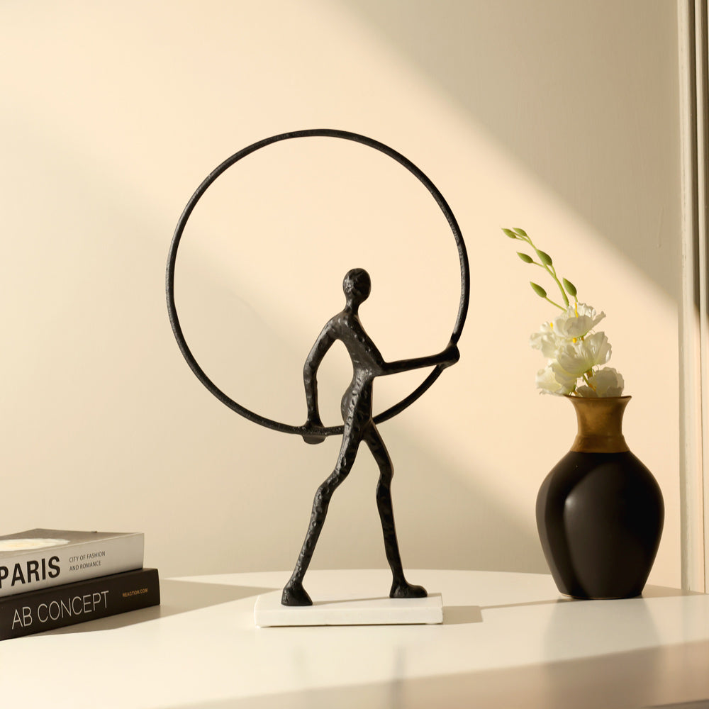 Man Walking with Ring Sculpture - Black