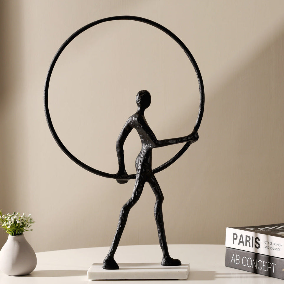 Man Walking with Ring Sculpture - Black