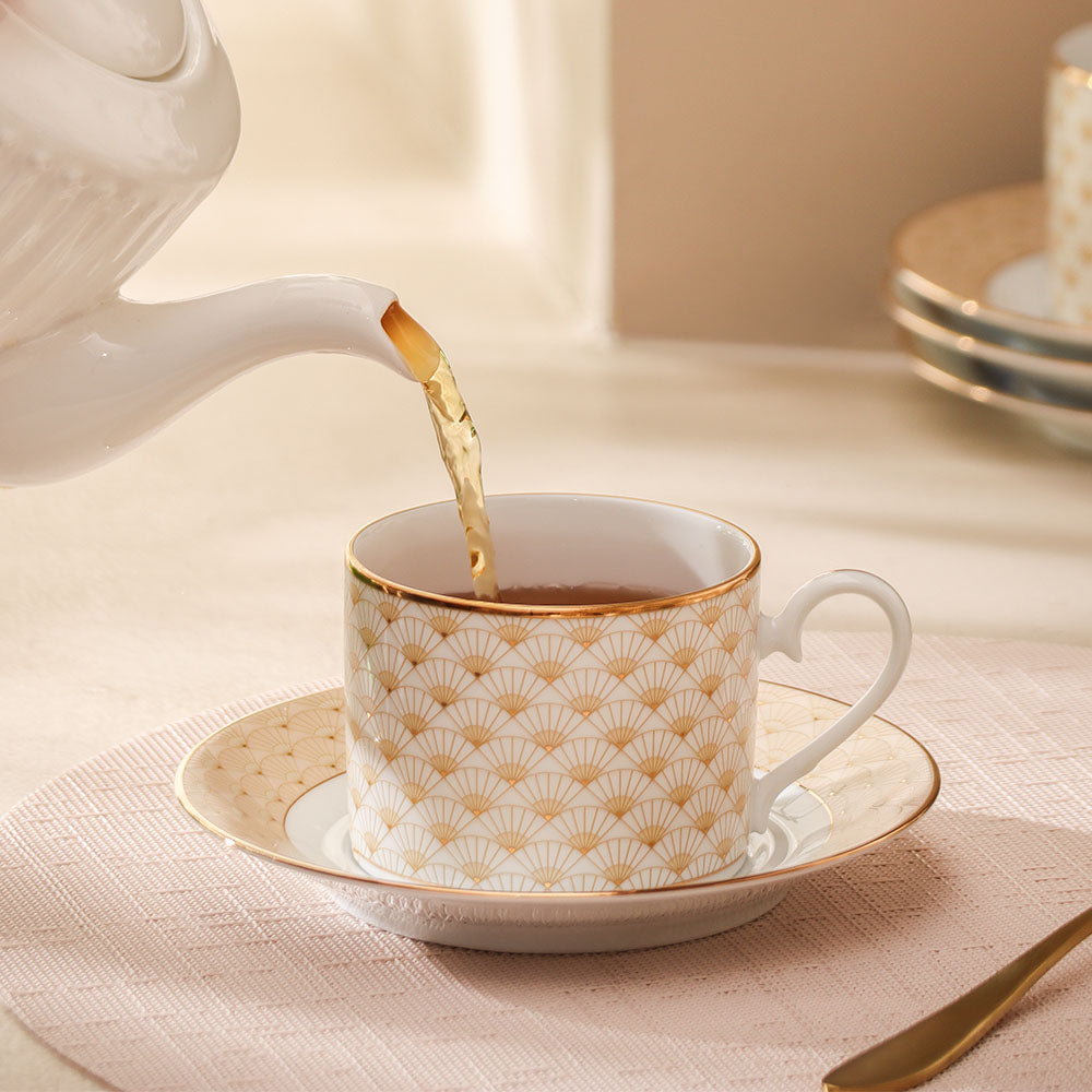 Trocadero 12-piece Porcelain Tea Set - Gold