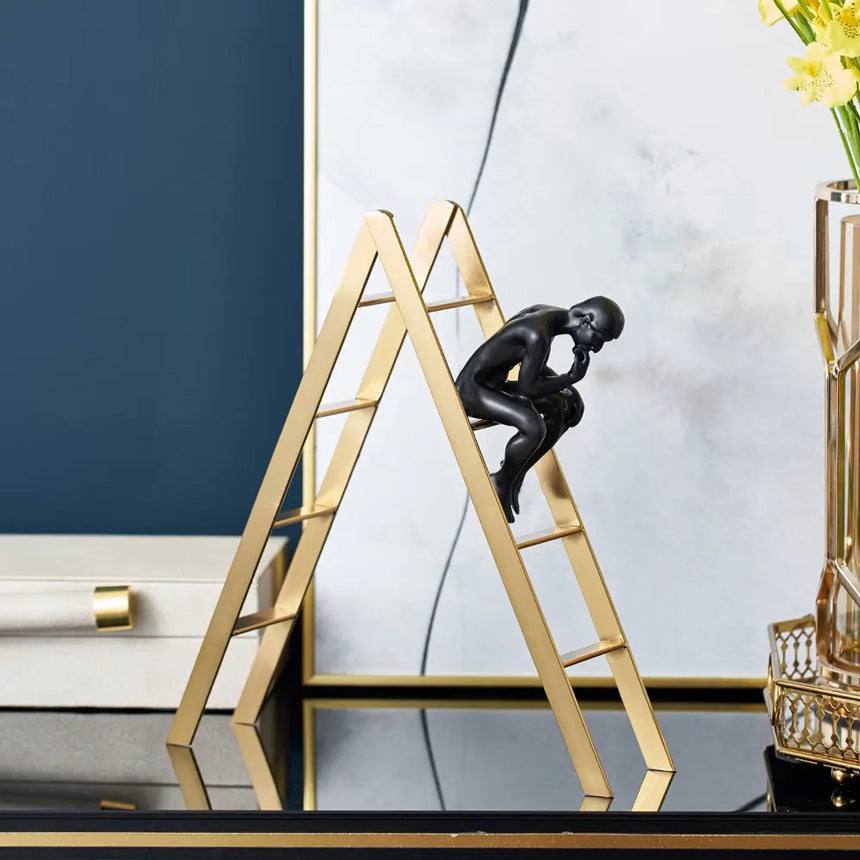 Enhabit Man on Ladder Decorative Accent - Black & Gold