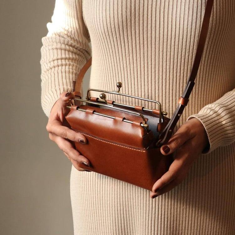 Nappa Dori Kisslock Sling Bag - Tan