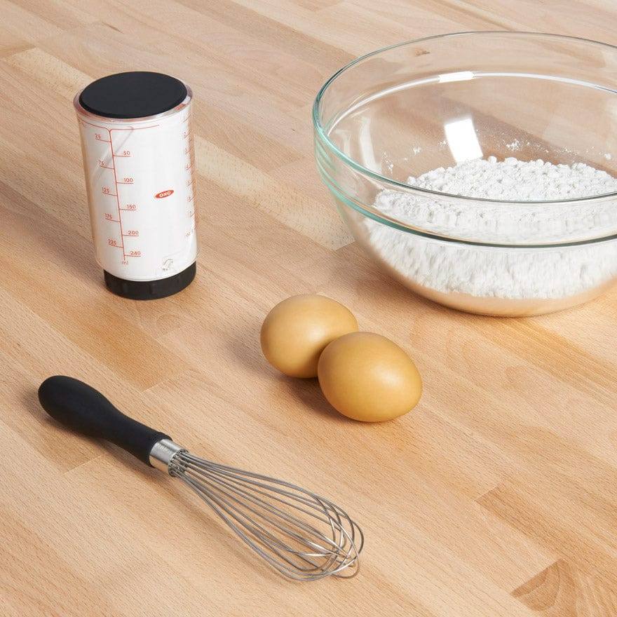 https://www.modernquests.com/cdn/shop/files/oxo-good-grips-whisk-black-3.jpg?v=1690055799