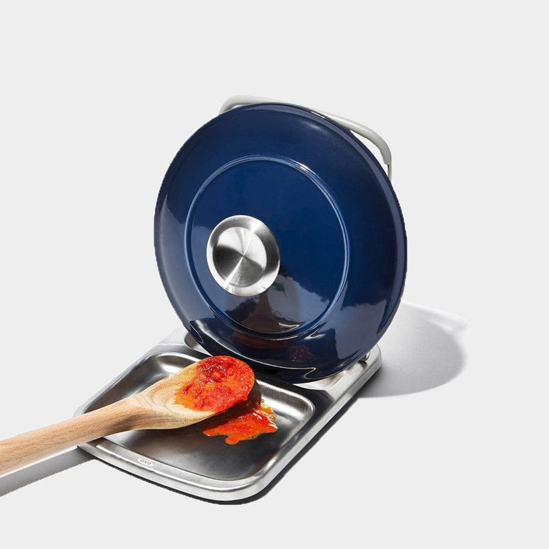 https://www.modernquests.com/cdn/shop/files/oxo-stainless-steel-spoon-rest-with-lid-holder-1_800x.jpg?v=1690056173