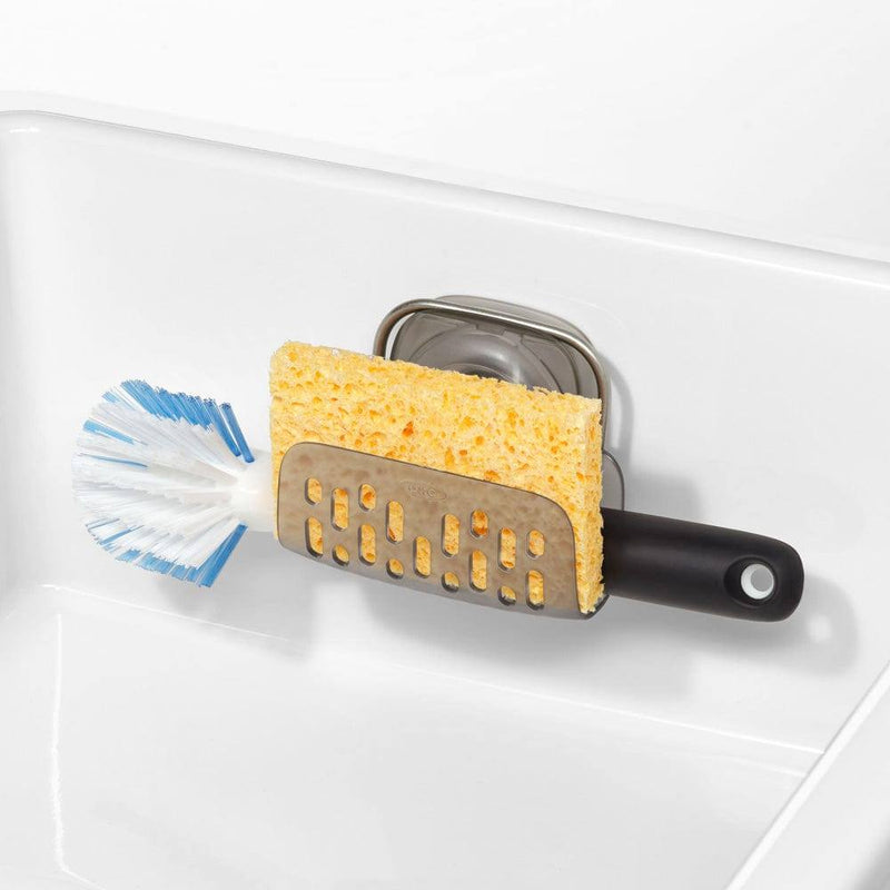 Use a razor holder with suction-cup to hold your dish scrubber so