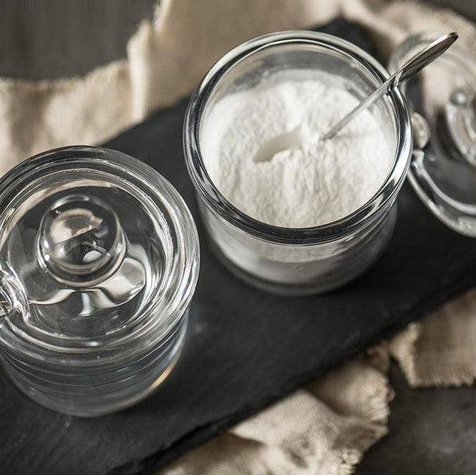 https://www.modernquests.com/cdn/shop/files/philosophy-home-condiment-jars-with-slate-board-set-of-2-4.jpg?v=1690034111