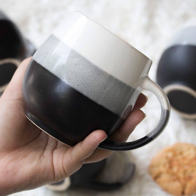 https://www.modernquests.com/cdn/shop/files/the-table-fable-ombre-coffee-mug-black-3.jpg?v=1690044637